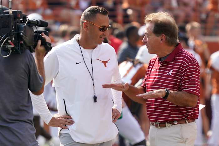 Sep 10, 2022; Austin, Texas, USA; Texas Longhorns head coach Steve Sarkisian talks with Alabama Crimson Tide head coach Nick Saban before the game at Darrell K Royal-Texas Memorial Stadium.